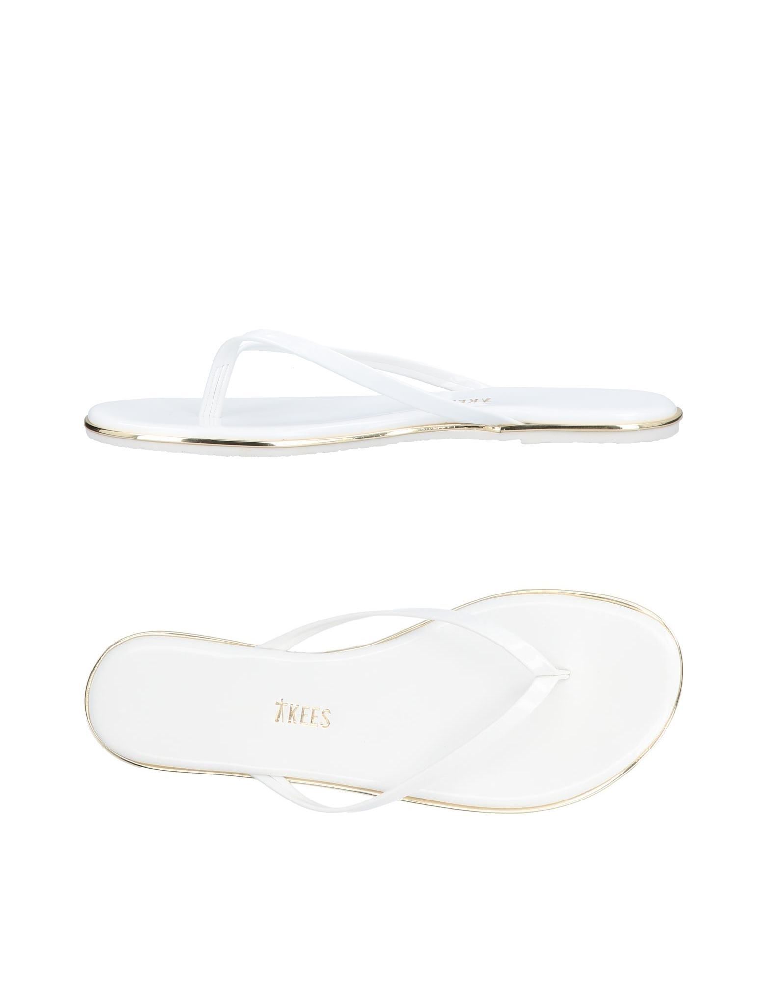 tkees white flip flops