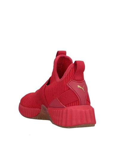 puma defy mid varsity red