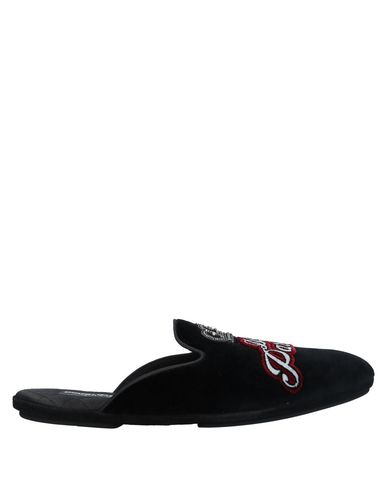 Click to view more detailed imagery on our partner's website Dolce & Gabbana Slippers In Black