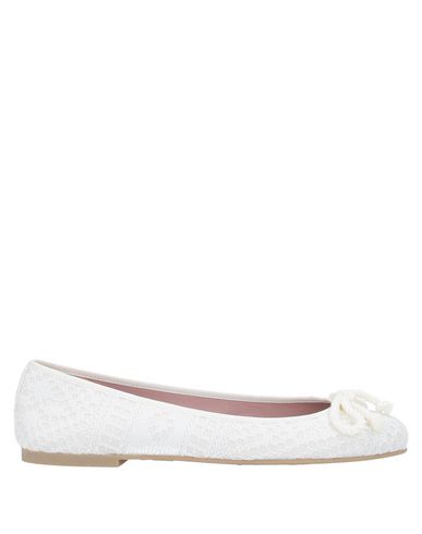 white flat ballerina shoes