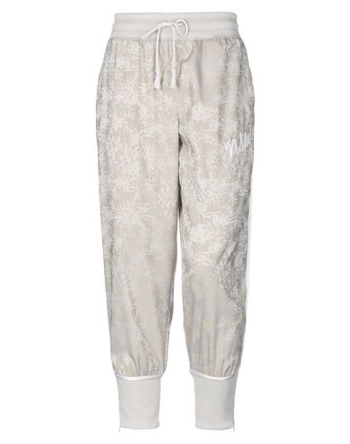 pantalones nike mujer beige