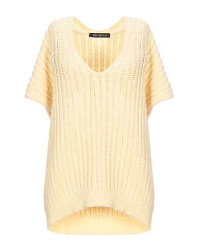 light yellow sweater