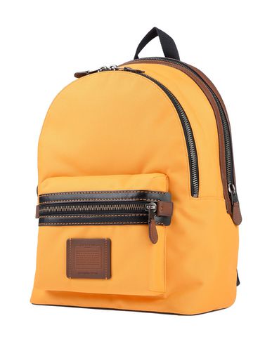 coach yellow backpack