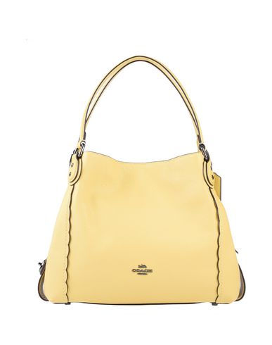 yellow coach handbag